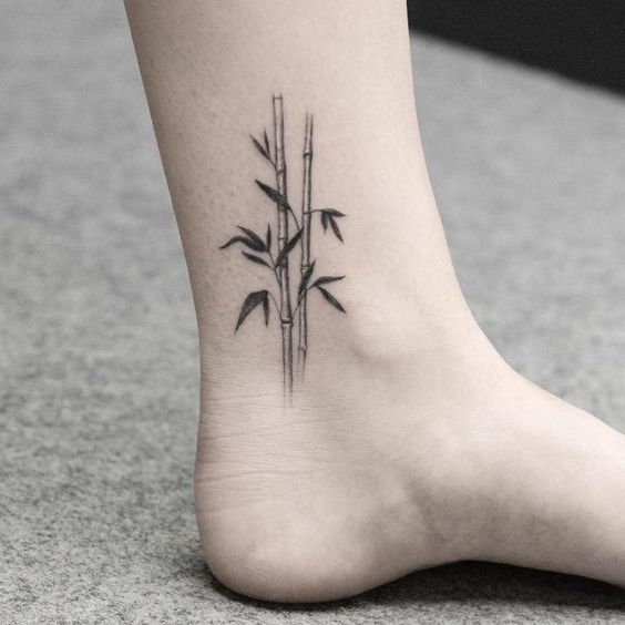 female wood element tattoo