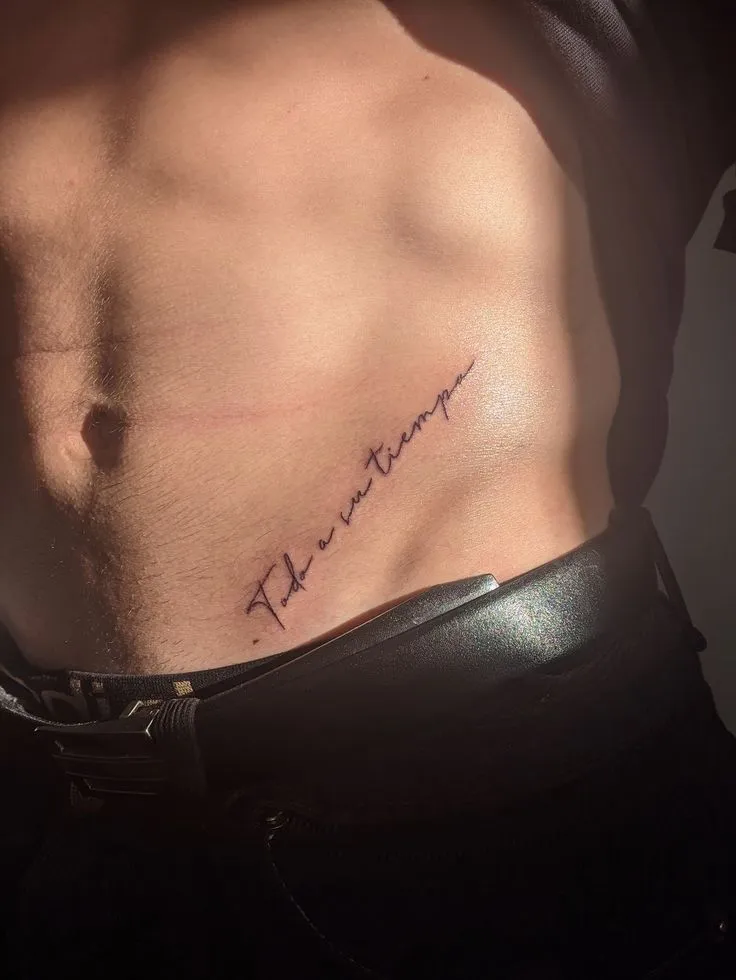 Carry your story with you - script tattoos on the hip transform meaningful words into an elegant, intimate display of art.