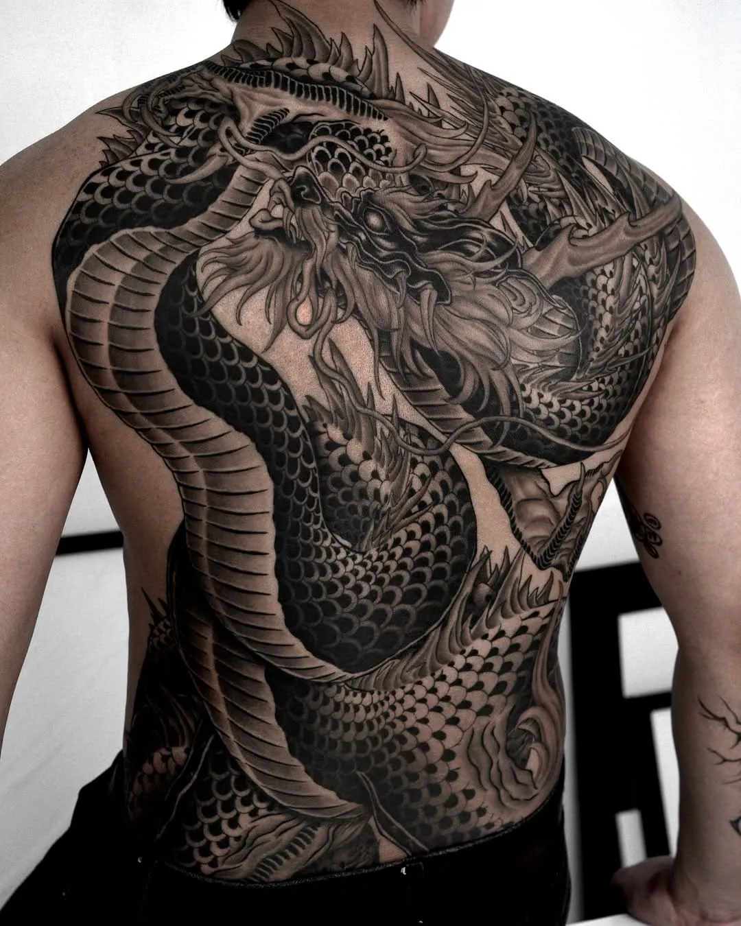 Full back black and white traditional Japanese dragon tattoo