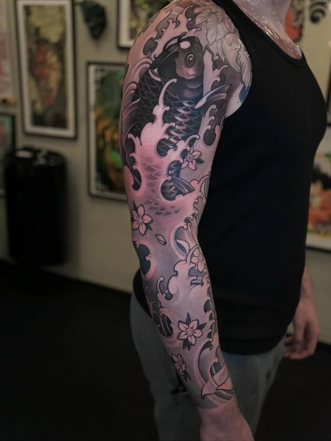 Full arm black and white traditional Japanese Koi fish tattoo