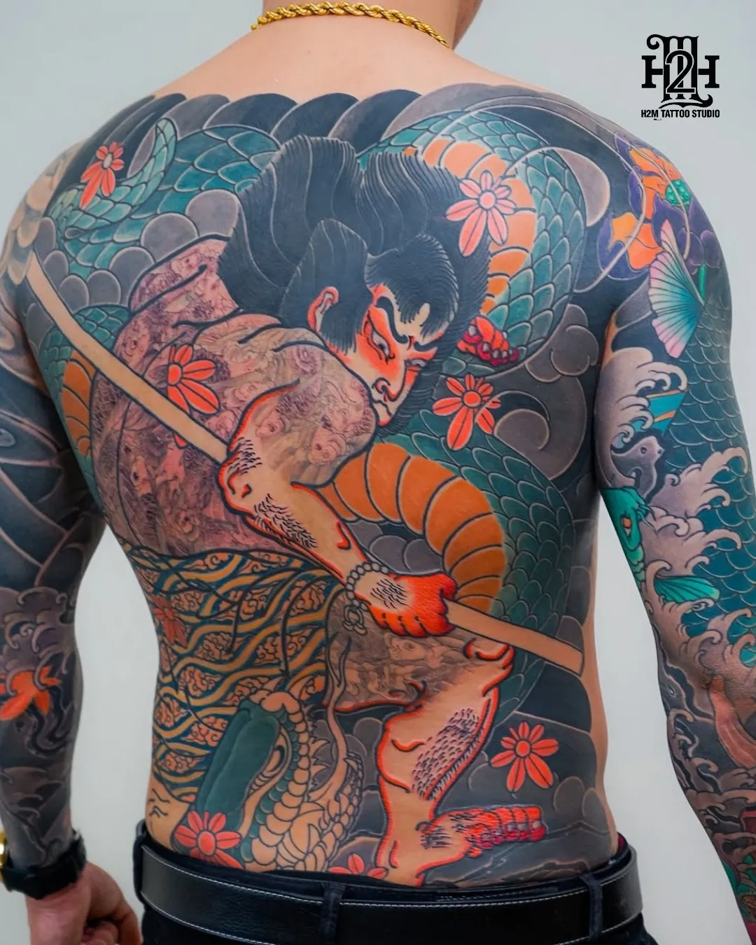 Full back traditional Japanese tattoo with samurai warrior tattoo