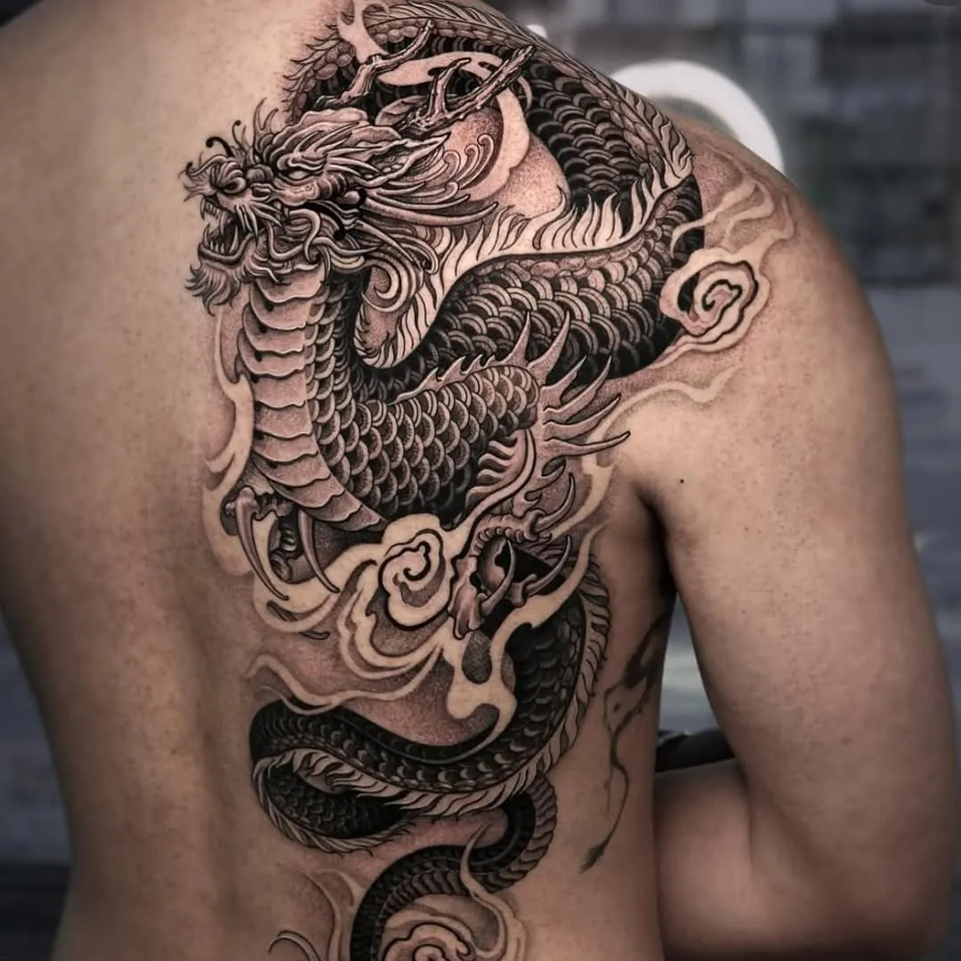 Half back Japanese tattoo with dragon