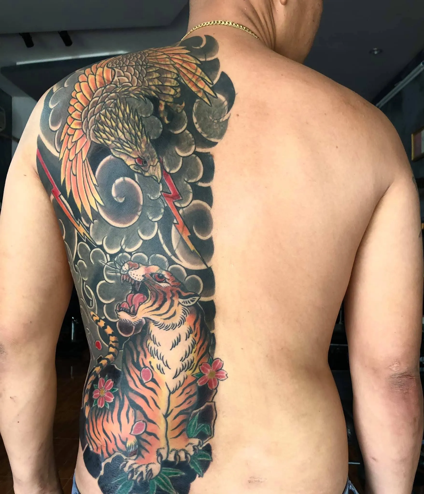 Half back Japanese tattoo with tiger