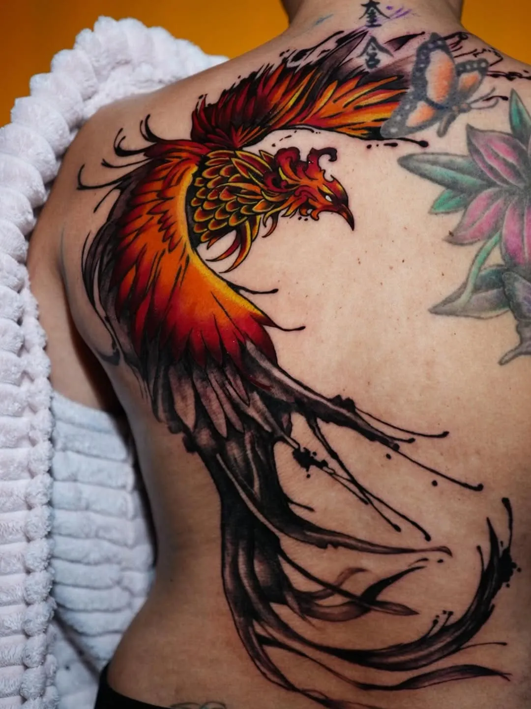 Half back Japanese tattoo with phoenix