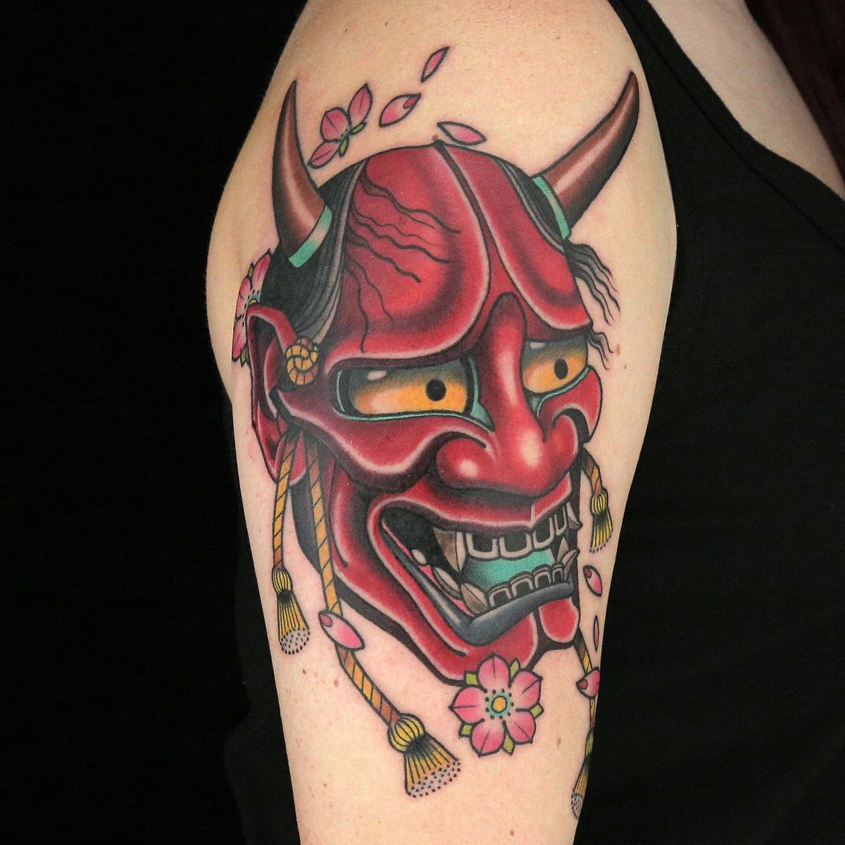Hannya mask tattoo on arm