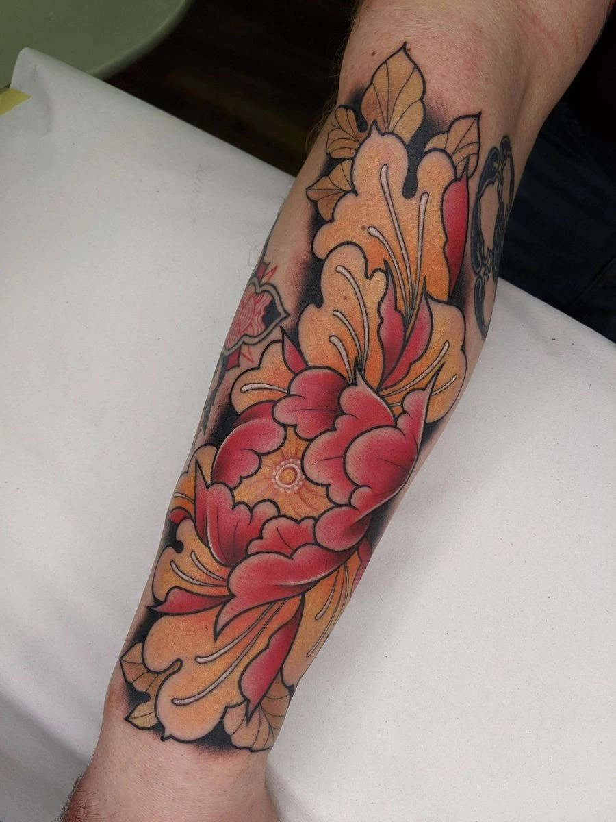 Chrysanthemum tattoo on hand