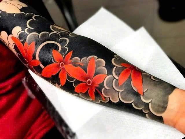 Maple leaf tattoo on hand