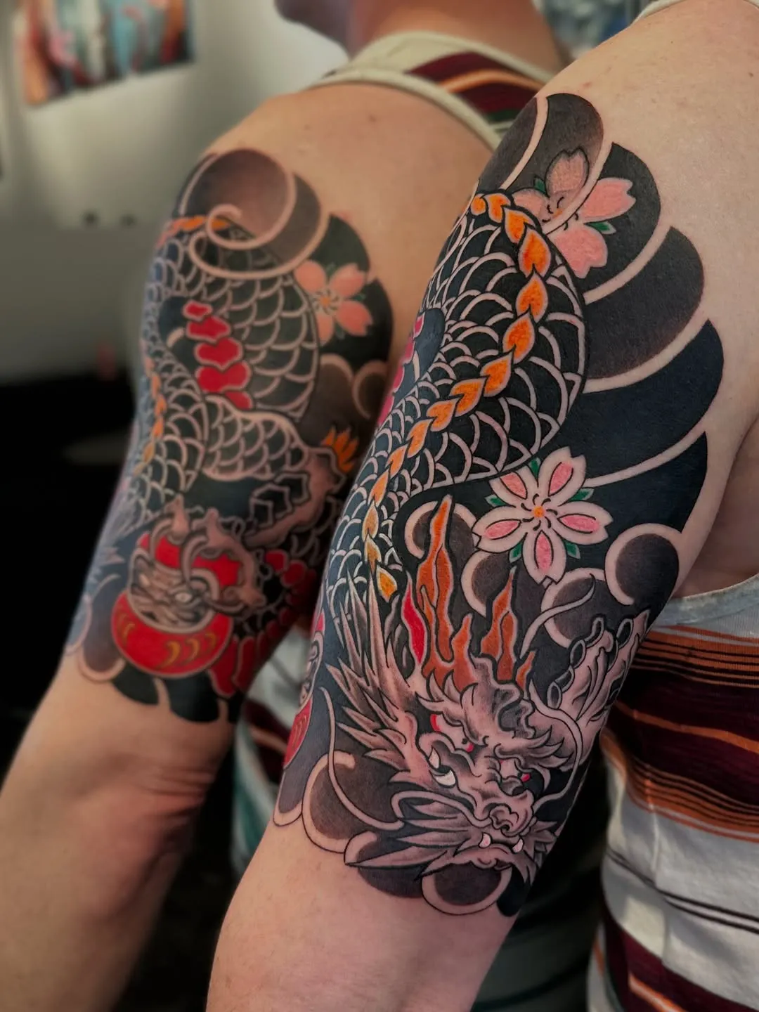 Traditional Japanese Bicep Tattoo of a fierce dragon