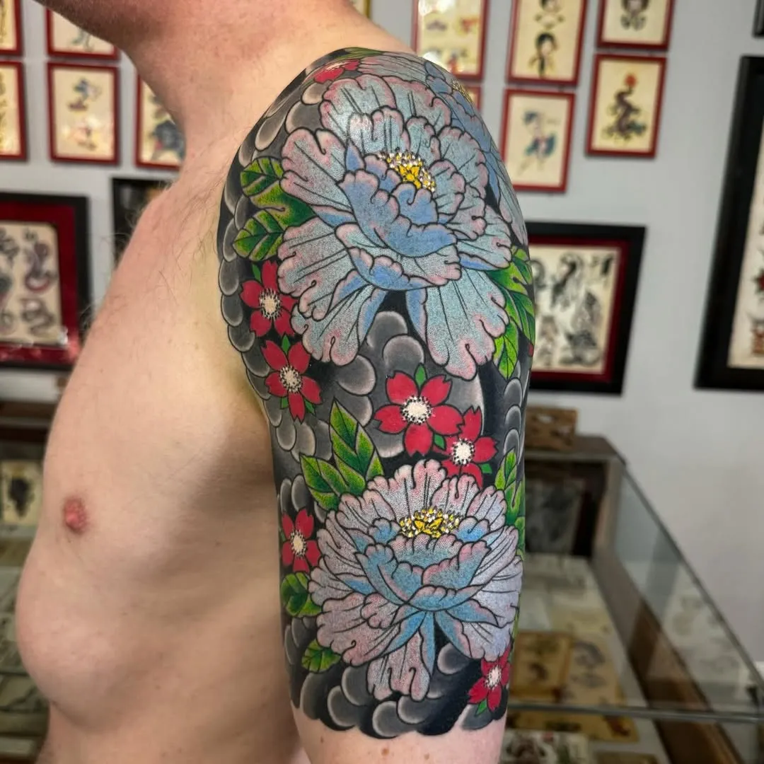 Bold Elegance in Traditional Japanese Bicep Tattoo