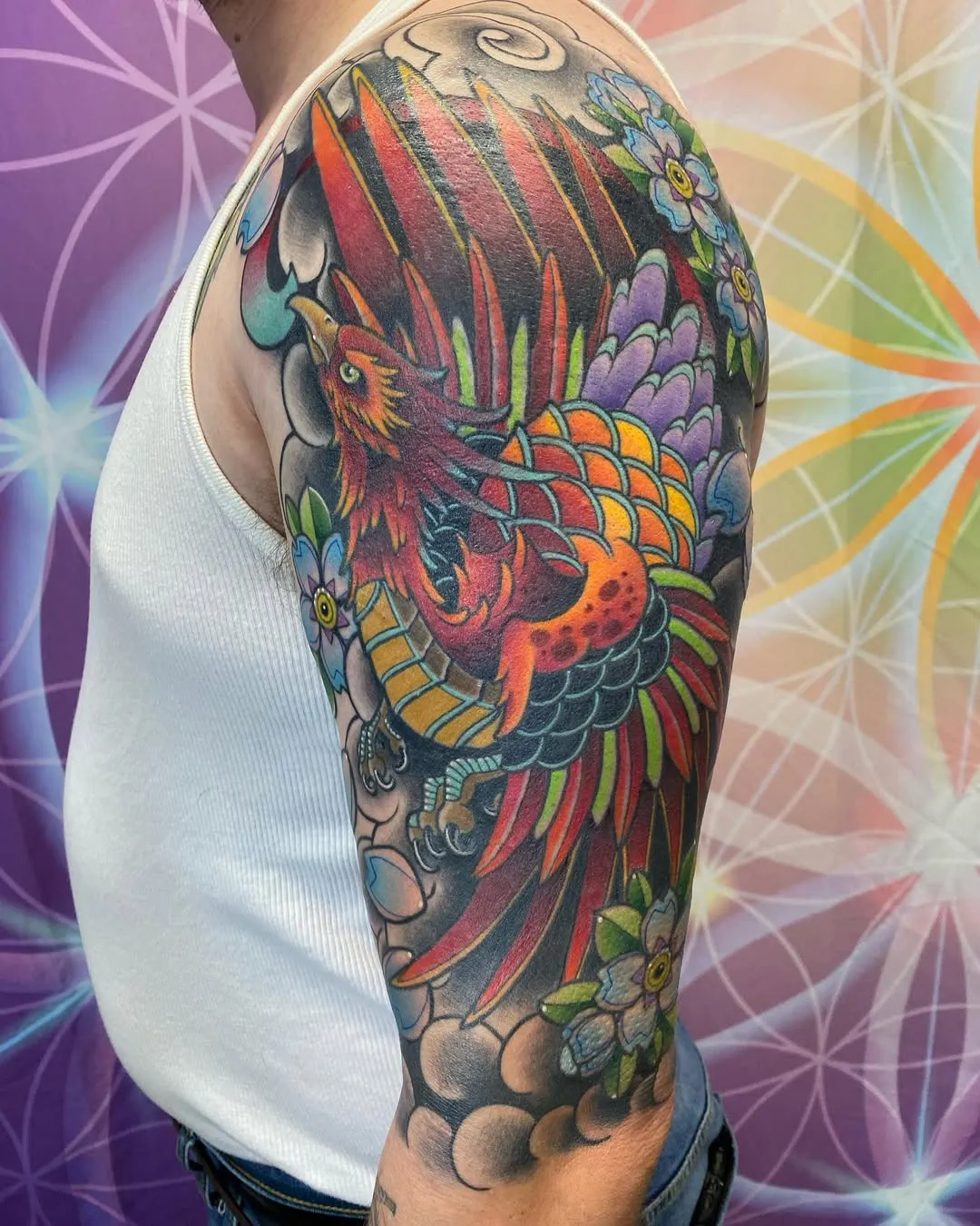 Traditional Japanese Bicep Tattoo featuring rising phoenix