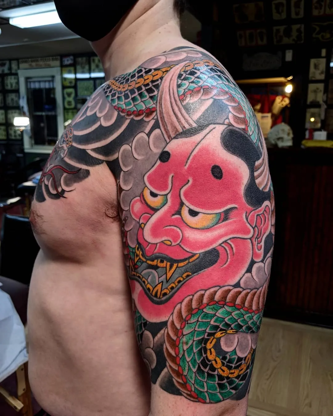 Traditional Japanese Bicep Tattoo Of Hannya Mask Features