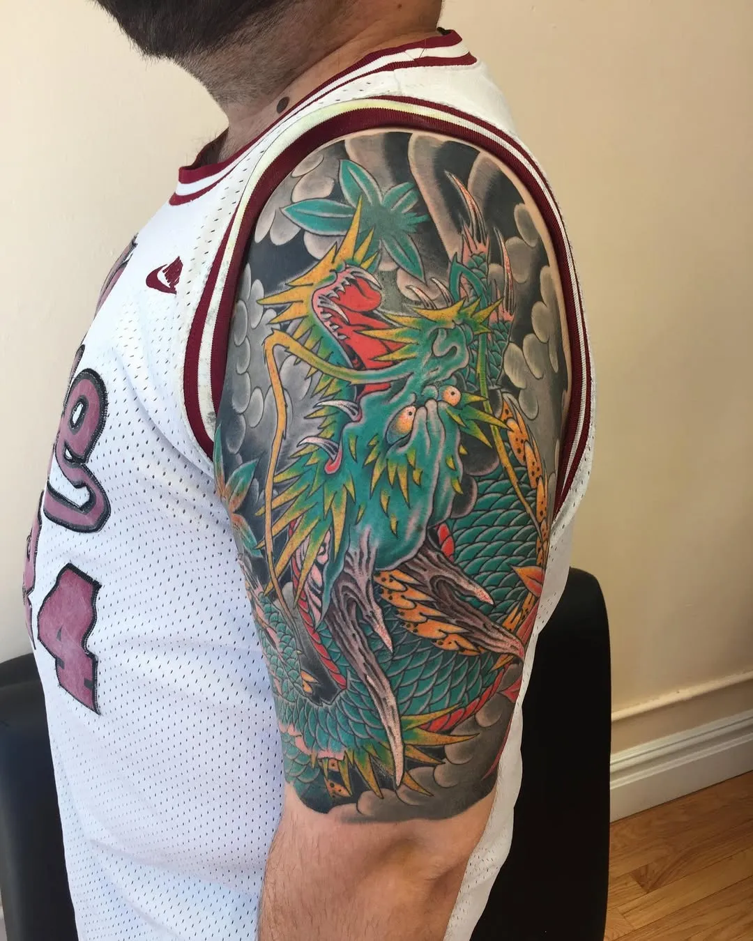 Traditional Japanese Bicep Tattoo featuring dragon spirit