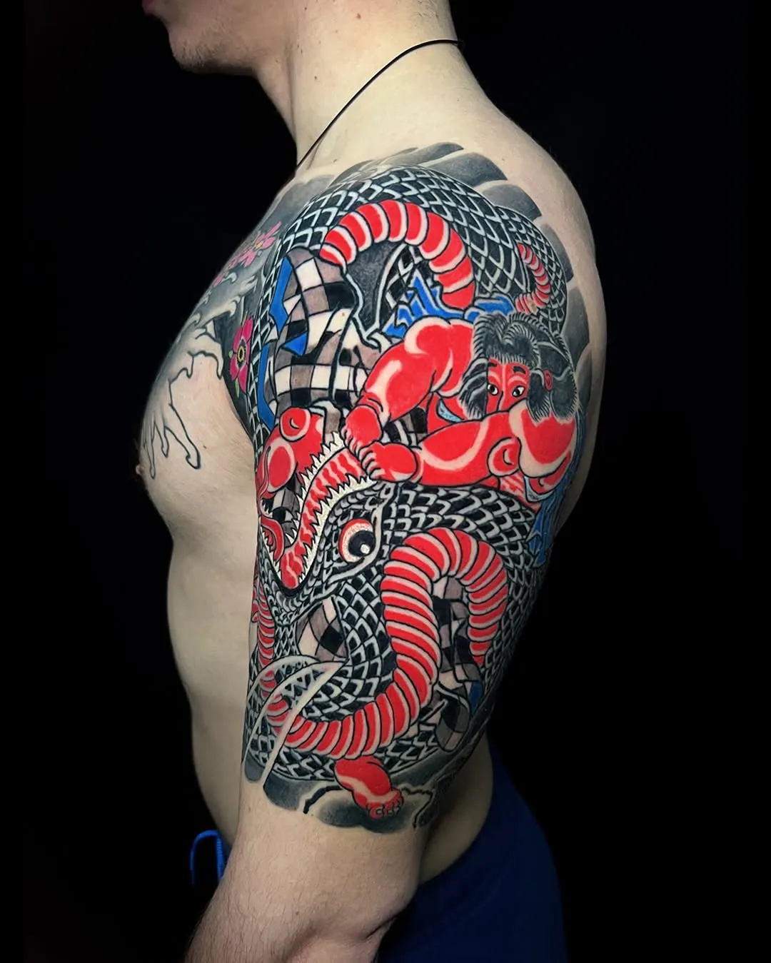 Traditional Japanese Bicep Tattoo of a Samurai