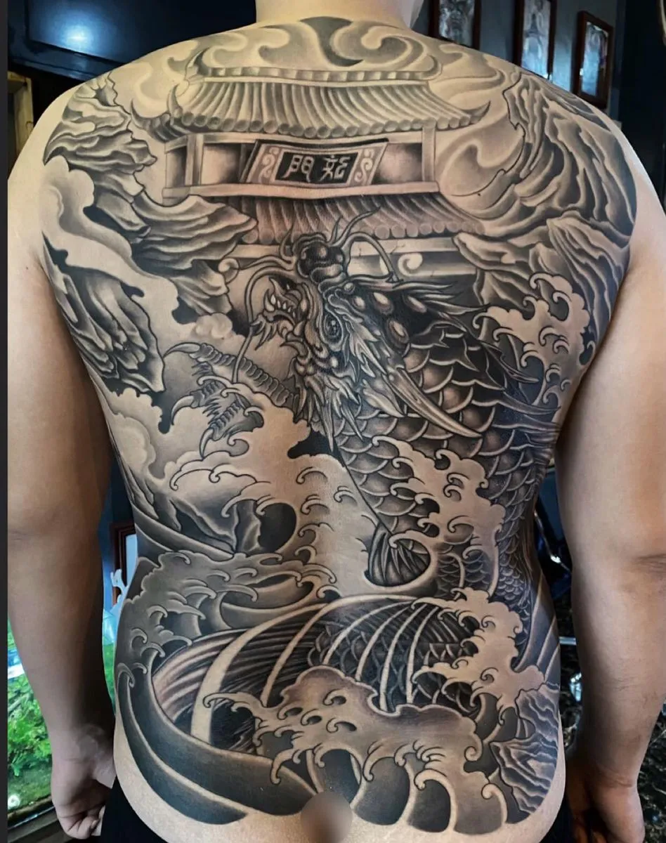 male wood element tattoo