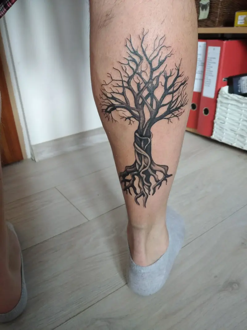 male wood element tattoo