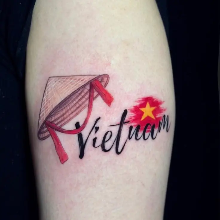 Vietnam flag and conical hat tattoo on shoulder – symbol of national pride