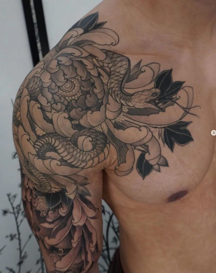 By following your body&rsquo;s natural architecture, a shoulder cap tattoo creates a dynamic, three-dimensional effect that moves as you do, turning anatomy into art.