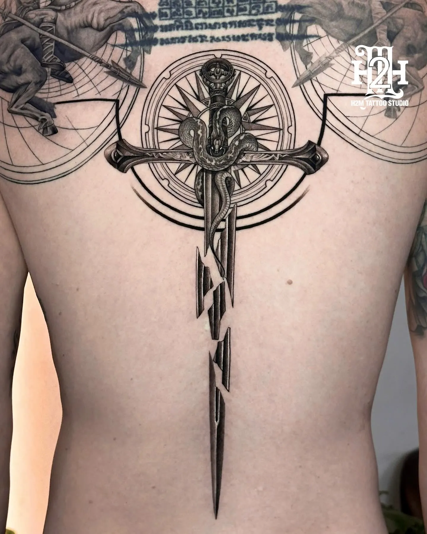 Spine Tattoos for Men: Styles, Pain & Design Ideas