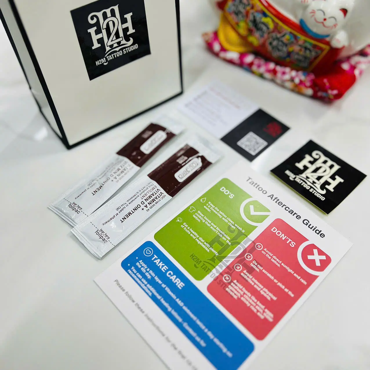 Vietnam tattoo aftercare kit from H2M Studio including healing balm, protective film, and care instructions for travelers
