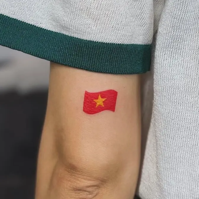 Vietnam flag tattoo on upper arm in Hanoi