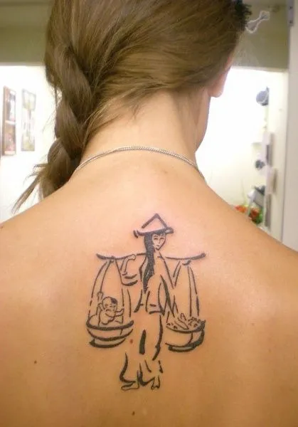 Vietnamese lady tattoo on back