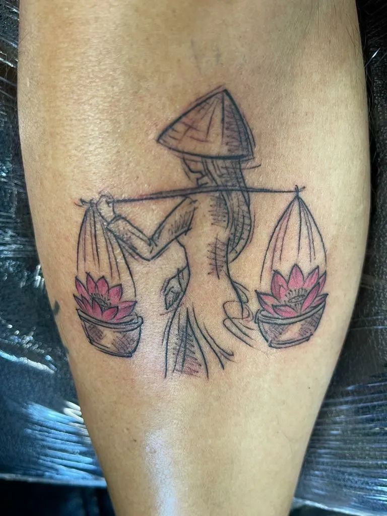 Vietnamese lady tattoo with lotus flower