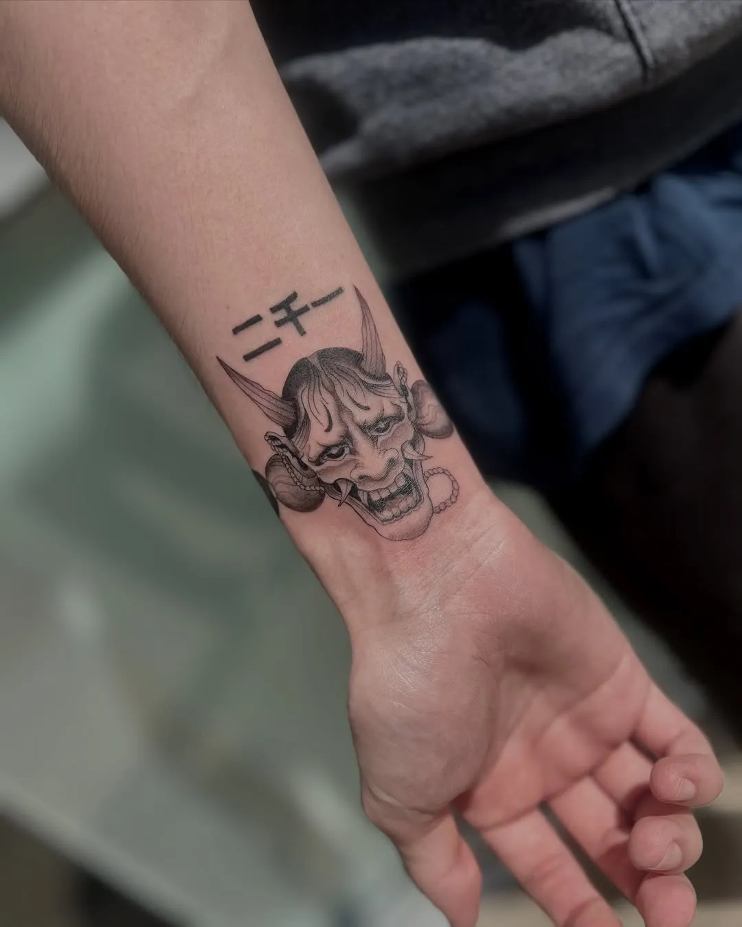 Top 15+ Demon Face Tattoo Designs on Hand: Powerful and Refined Symbols of Protection