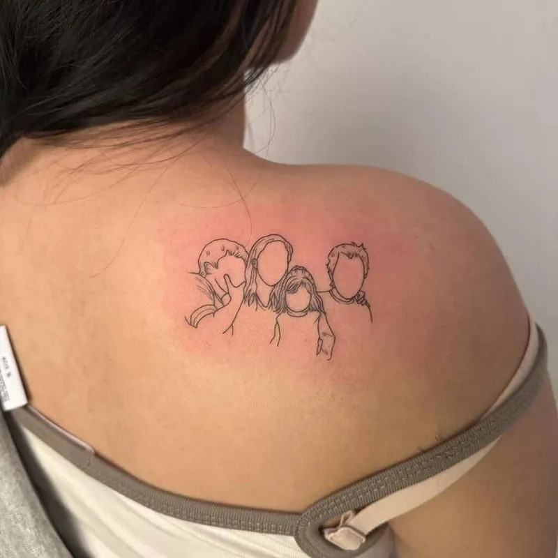 family tattoo of 4 people