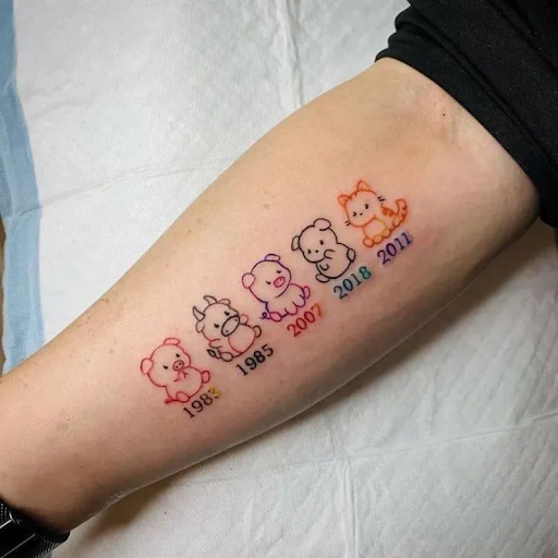 family tattoo of 4 people