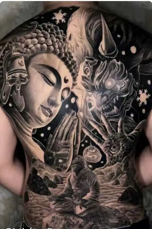 full back demon face tattoo