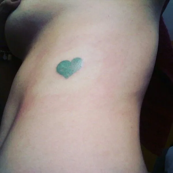 Old school green heart tattoo