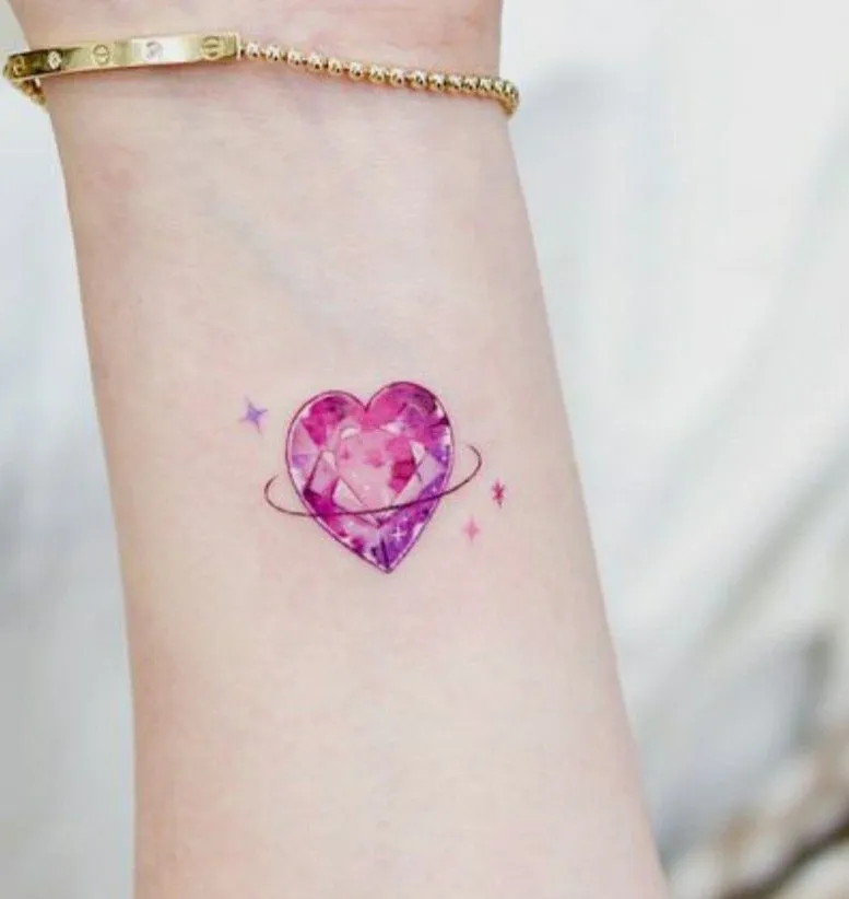 Old school pink heart tattoo