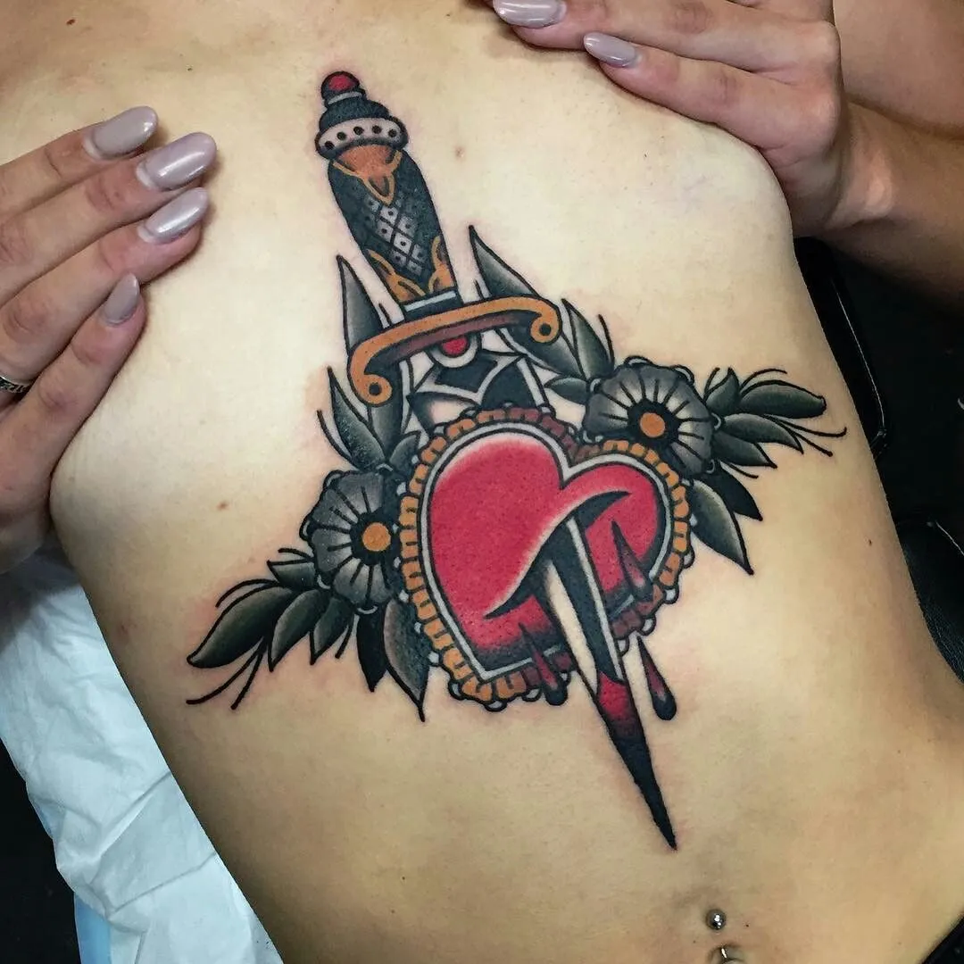Old school heart tattoo on chest