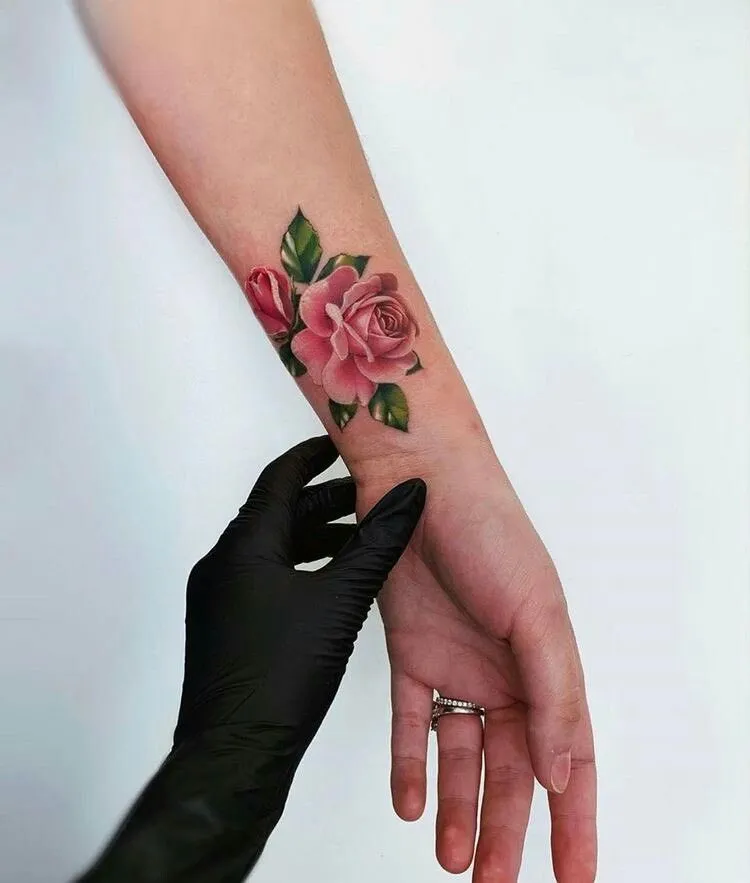 Old school rose tattoo on forearm