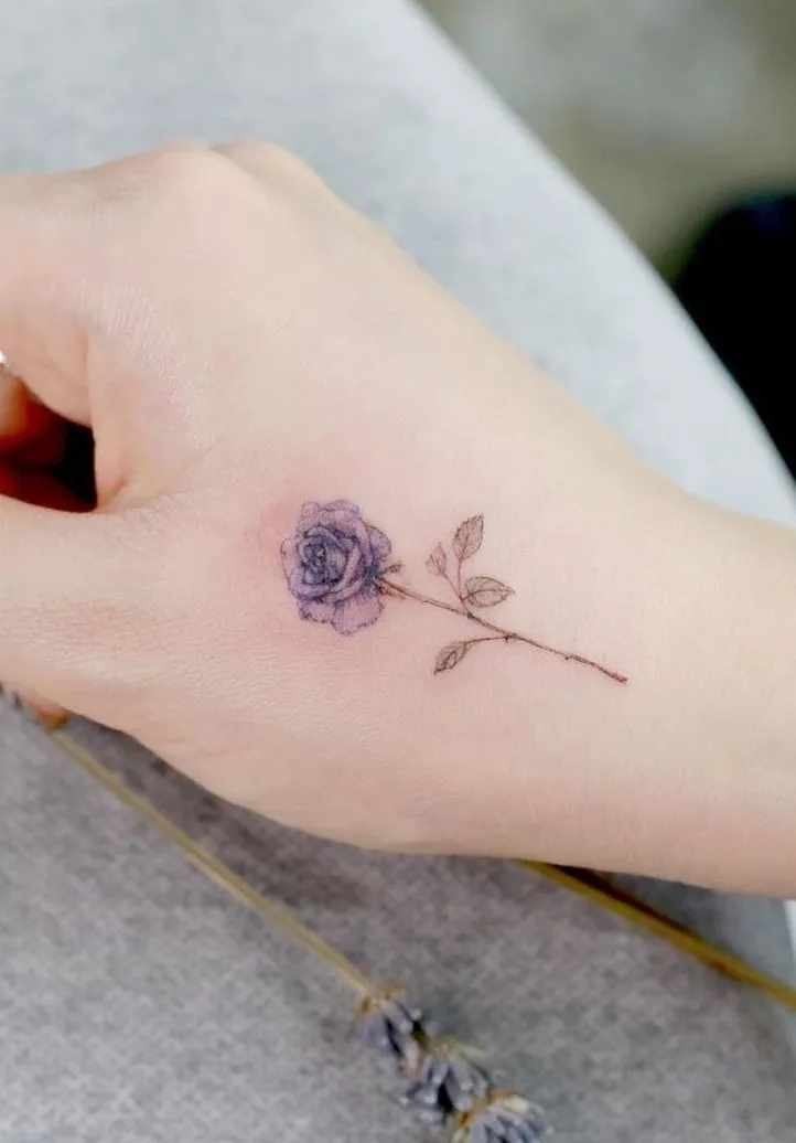 Old school rose tattoo on hand