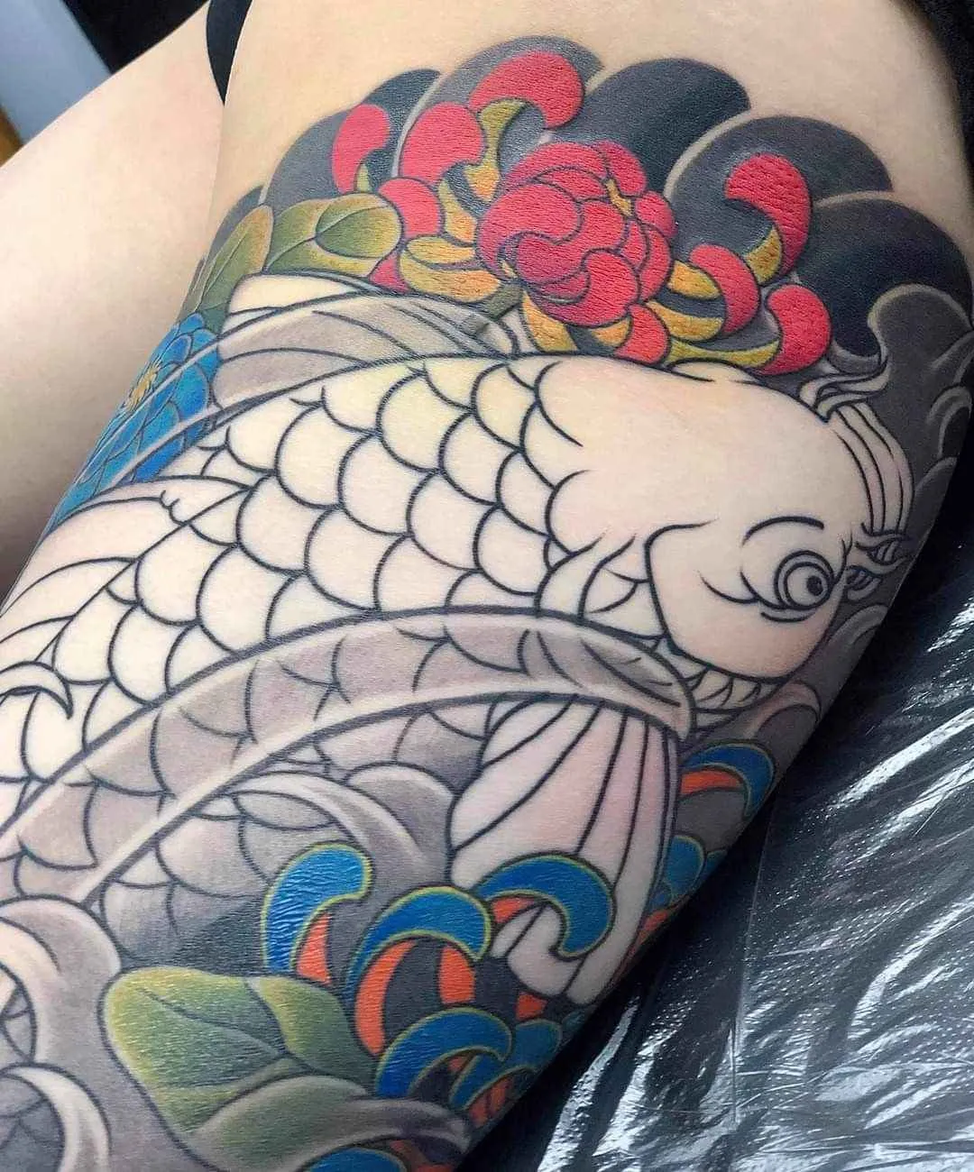 Top 16 Most Elegant Lotus and Koi Fish Tattoo Designs for 2026