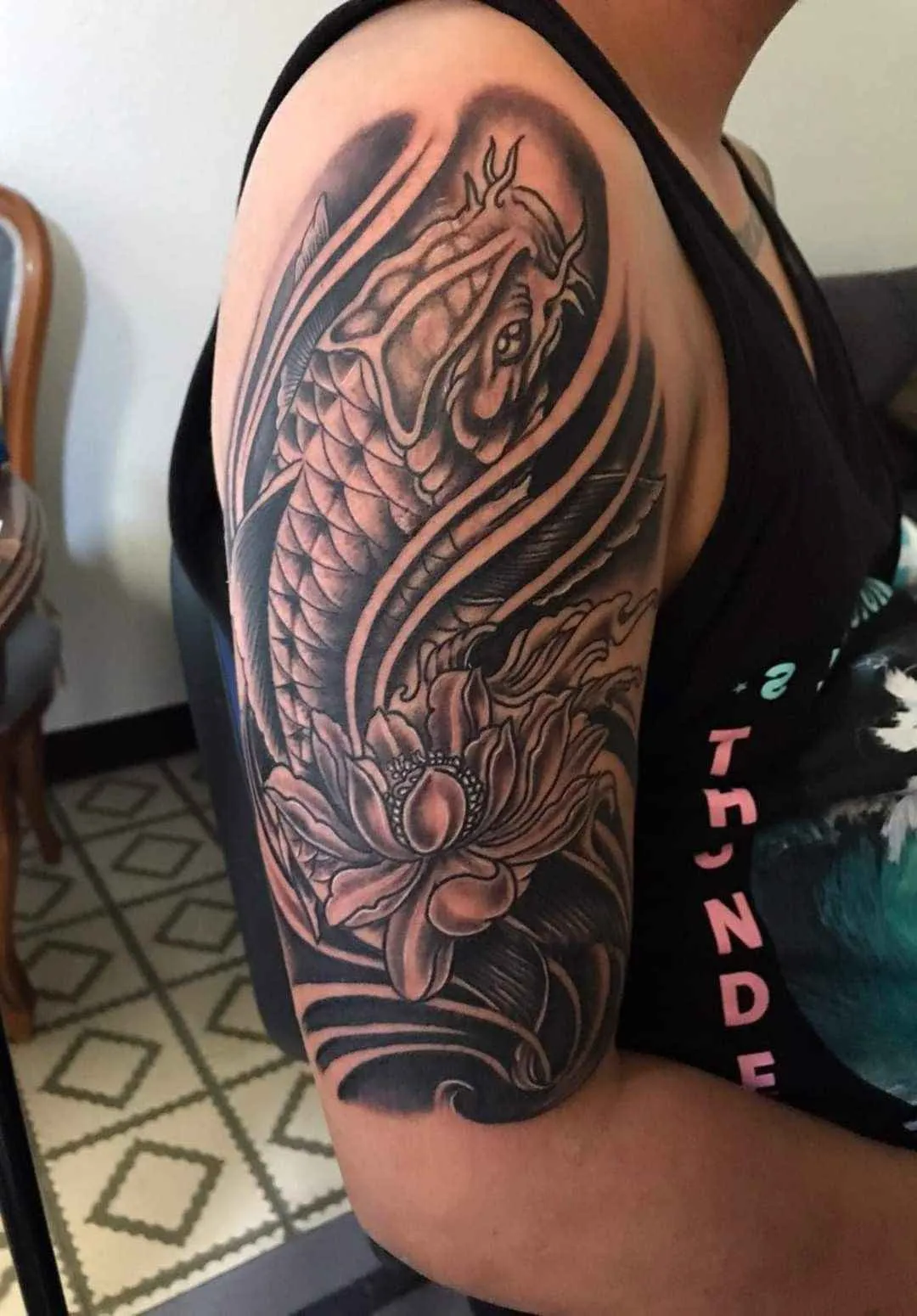 Top 16 Most Elegant Lotus and Koi Fish Tattoo Designs for 2026