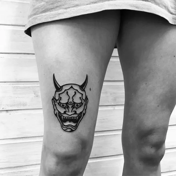 Top 20+ Mini Demon Face Tattoo Designs: Subtle Protective Symbols and Embrace of Feminine Strength