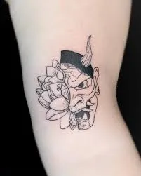 Top 20+ Mini Demon Face Tattoo Designs: Subtle Protective Symbols and Embrace of Feminine Strength