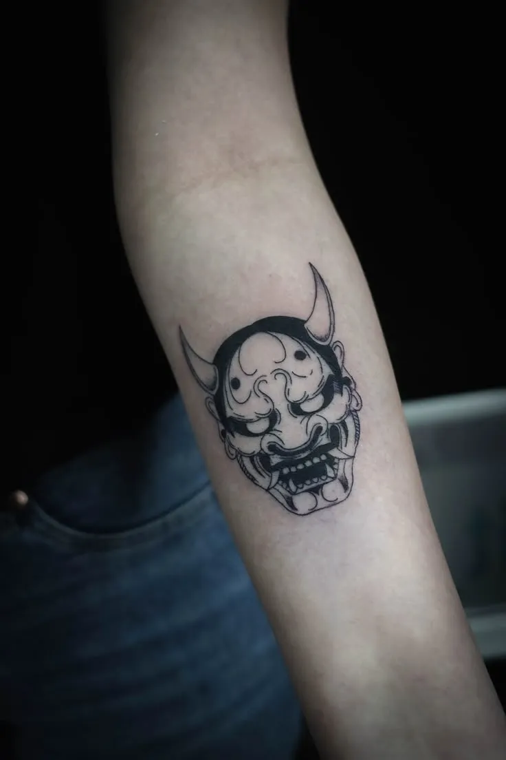 Top 20+ Mini Demon Face Tattoo Designs: Subtle Protective Symbols and Embrace of Feminine Strength