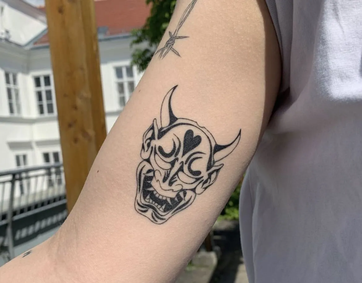 Top 20+ Mini Demon Face Tattoo Designs: Subtle Protective Symbols and Embrace of Feminine Strength