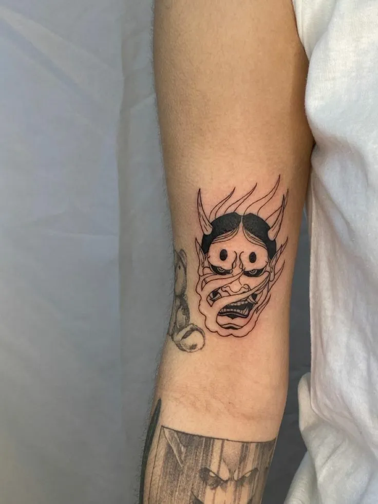 Top 20+ Mini Demon Face Tattoo Designs: Subtle Protective Symbols and Embrace of Feminine Strength